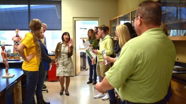 Faculty member giving a tour of a science lab